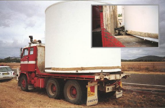 A truck carrying a large concrete tank. Inset: The tank is not restrained appropriately