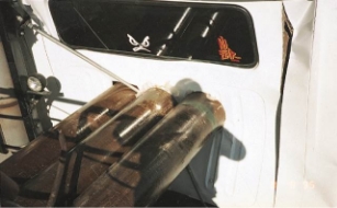 Close up view of the pipes penetrating into the cab of the truck