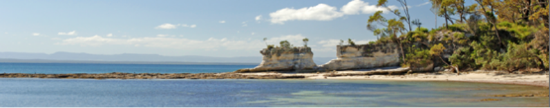 Photograph of hole in the wall -  a natural feature on the coastline of Booderee National Park