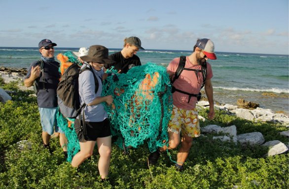 Coral Sea clean-up. Image copyright of Andy Warmbrunn, Parks Australia.
