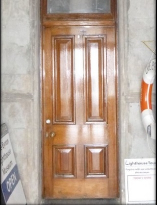 cedar door into tower foyer 