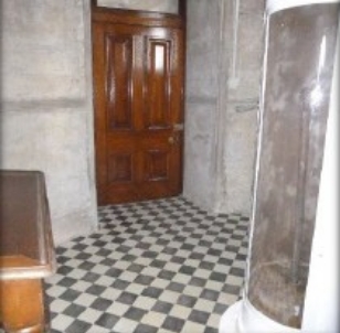 ground floor clockwork mechanism, cedar door and writing desk 