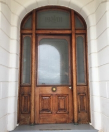 pavilion cedar door with arched windows 