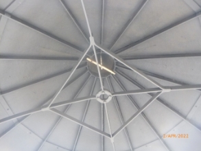 Photograph of underside of lantern roof. Shows exposed cast metal ribs.