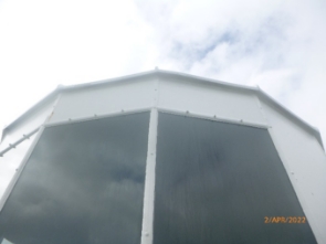 Photograph of clear glass panels fitted into to astragal frames.