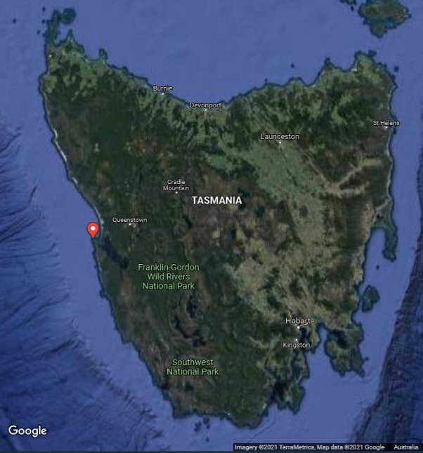 Satellite map of Tasmania, red marker marks position of Cape Sorell on the western coast.