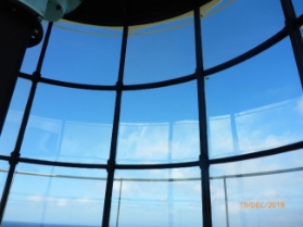 Photograph of curved lantern room glazing panes fitted into astragals.
