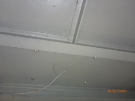 Photograph of underside of lantern floor supported by steel joints.