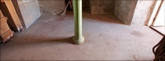 Photograph of ground floor with column fitted in centre.