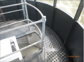 Photograph showing curved internal catwalk fitted to edge of lantern room.