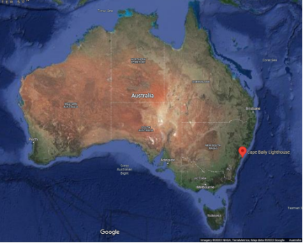 Satellite map showing Australian continent with red marker indicating location of Cape Baily Lighthouse on eastern coastline.