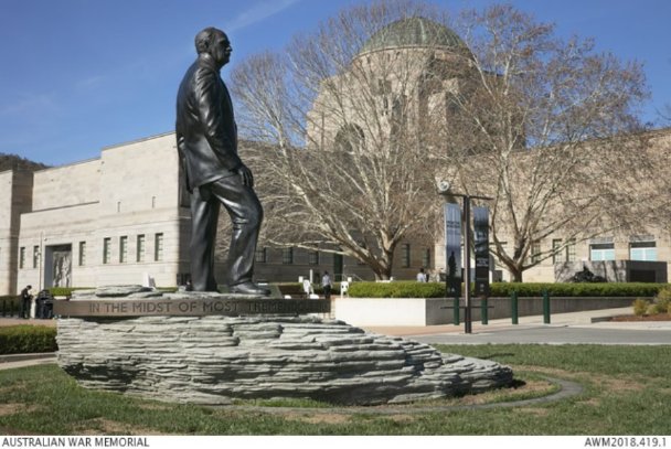 General Sir John Monash Sculpture, Monash is standing in a strong position with a stone base.