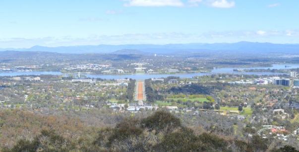 Image from the Mount Ainslie summit looking down onto the back of the memorial, Anzac parade and parliment house.