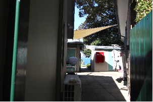 A picture of a narrow walkway to the Kirribilli House storeroom.