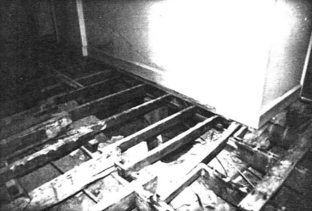 A black and white picture of Kirribilli House floorboards in rows panelling from beneath the walls.